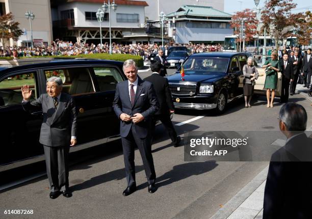 Belgium's King Philippe and Queen Mathilde and Japan's Emperor Akihito and Empress Michiko arrive at the Yuki Information Communication Center in...