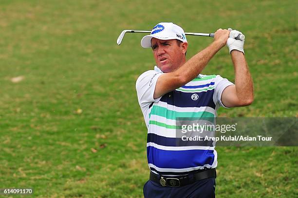 Scott Hend of Australia plays a shot during the Pro-Am for the 2016 Venetian Macao Open at Macau Golf and Country Club on October 12, 2016 in Macau,...