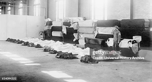 Corpses Laying on Floor with Coffins Lining Wall, Great Dayton Flood, Dayton, Ohio, USA, circa 1913.