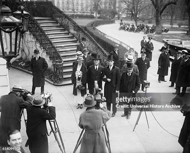 Eleanor Roosevelt and U.S. President Franklin D. Roosevelt with photographers outside White House on Inauguration Day, Washington DC, USA, March 4,...