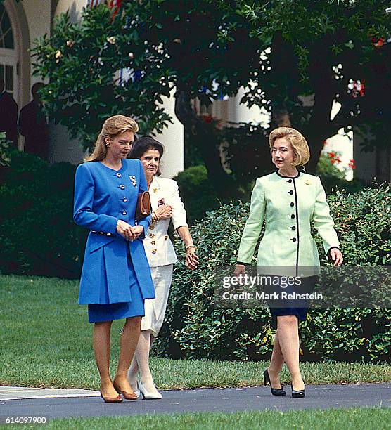 From left, Jordan's Queen Noor, Israel's Leah Rabin, and US First Lady Hillary Clinton walk towards the White House's South Lawn to attend the...