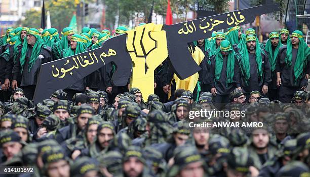 Members of Lebanon's Shiite movement Hezbollah take part in Ashura commemorations in a southern Beirut suburb on October 12, 2016. Hezbollah held a...