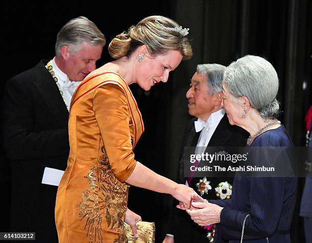 Emperor Akihito and Empress Michiko welcome King Philippe and Queen Mathilde of Belgium prior to the state dinner at the Imperial Palace on October...