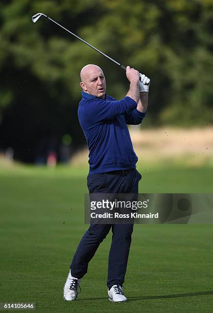 Former rugby player Keith Wood plays a shot on the second hole during the Hero Pro-Am at The Grove on October 12, 2016 in Watford, England.