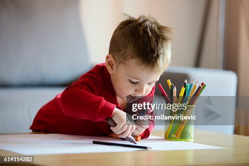 Happy little boy coloring Happy little boy coloring