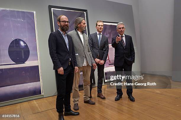 Curator Matthias Ulrich, artist Ulay , Director of Schirn Museum, Phillip Demandt, and Mayor of Frankfurt am Main, Peter Feldmann, are seen during a...