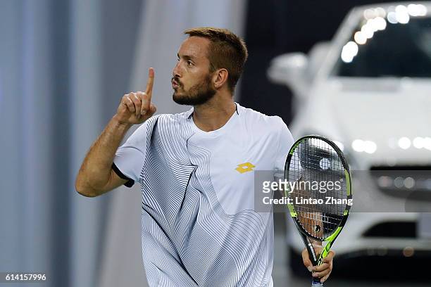 Viktor Troicki of Serbia celebrates after win over Rafael Nadal of Spain during the Men's singles second round match on day four of Shanghai Rolex...