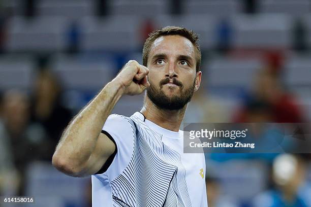 Viktor Troicki of Serbia celebrates after win over Rafael Nadal of Spain during the Men's singles second round match on day four of Shanghai Rolex...