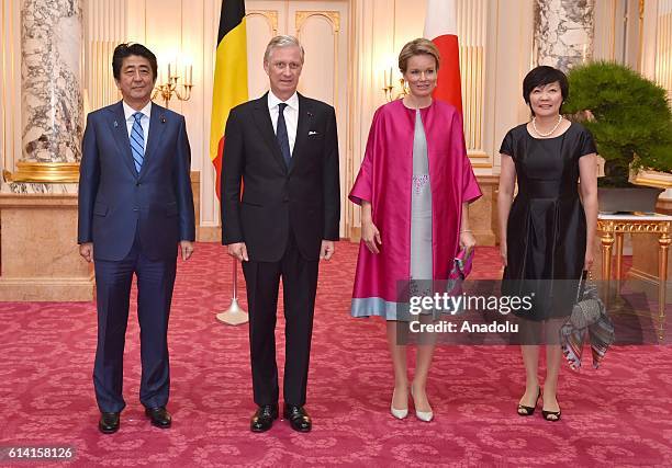 Belgium's King Philippe and Queen Mathilde , Japan's Prime Minister Shinzo Abe and his wife Akie pose for a photo at the state guest house in Tokyo,...