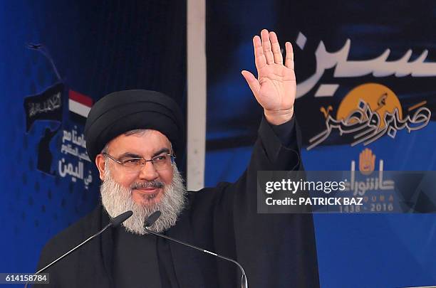 Lebanon's Shiite movement Hezbollah's leader Hassan Nasrallah addresses a crowd during commemorations for Ashura in a southern Beirut suburb on...