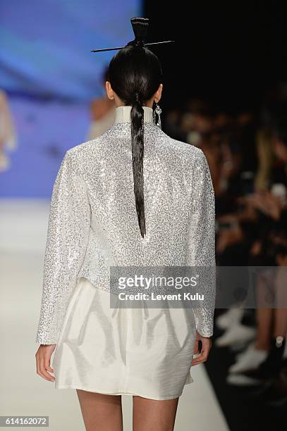 Model walks the runway at the Selma State show during Mercedes-Benz Fashion Week Istanbul at Zorlu Center on October 12, 2016 in Istanbul, Turkey.