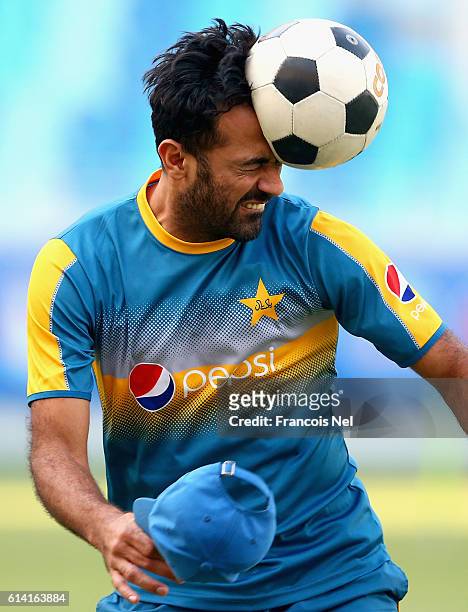 Wahab Riaz of Pakistan warms up during a nets session at Dubai International Cricket Ground on October 12, 2016 in Dubai, United Arab Emirates.