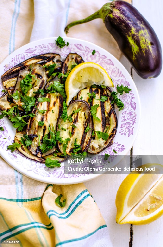 Salad of grilled eggplant with lemon and parsley