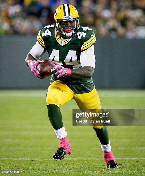 James Starks of the Green Bay Packers runs with the ball in the fourth quarter against the New York Giants at Lambeau Field on October 9, 2016 in...