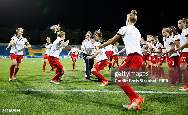 Players of Germany are pictured during warm-up prior to the FIFA U-17 Women's World Cup Quarter Final match between Germany and Spain at Amman...