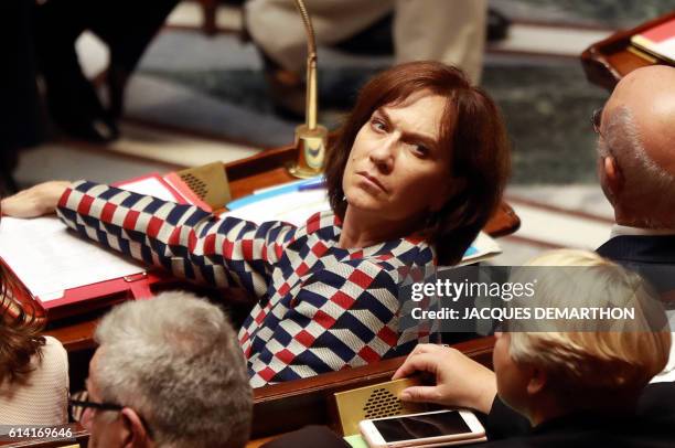 French Minister for Family, Children and Women's Rights Laurence Rossignol looks on during a session of questions to the government at the National...