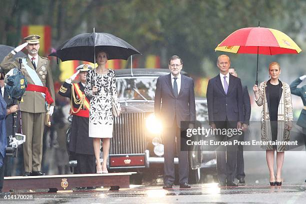 King Felipe of Spain, Queen Letizia of Spain, Mariano Rajoy, Pedro Morenes and Cristina Cifuentes attend the National Day Military Parade 2016 on...