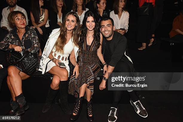 Selma Cilek , Ceylan Capa and Mert Vidinli attend the Rasit Bagzibagli Runway show for Mercedes-Benz Fashion Week Istanbul at Zorlu Center on October...