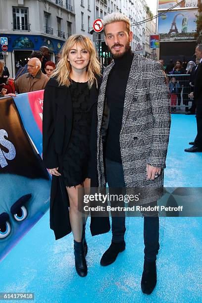 French voices of the movie, Louane Emera and Matt Pokora attend "Les Trolls" Paris Premiere at Le Grand Rex on October 12, 2016 in Paris, France.