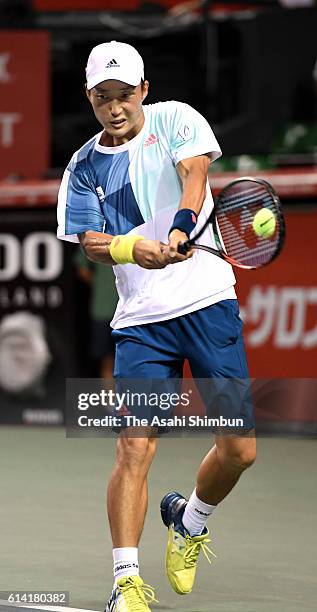 Go Soeda of Japan plays a backhand during the men's singles first round match against Fernando Verdasco of Spain on day one of Rakuten Open 2016 at...