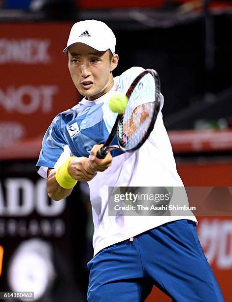 Go Soeda of Japan plays a backhand during the men's singles first round match against Fernando Verdasco of Spain on day one of Rakuten Open 2016 at...