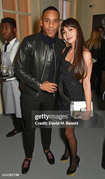 Reggie Yates and Zara Martin attend the launch of the Esquire Townhouse with Dior on October 12, 2016 in London, England.