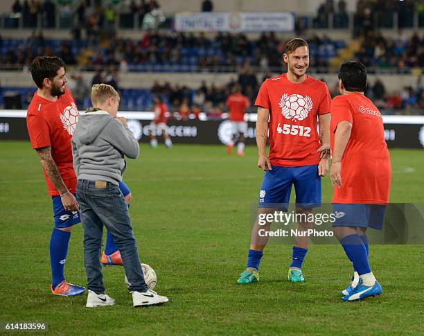 Christian Totti, Maradona Jr, Francesco Totti and Diego Maradona during the match for the peace - Uniti per la Pace at the Olympic Stadium in Rome,...