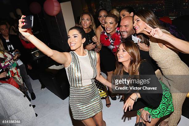 Laura G takes a selfie with Liza Echeverria, Maya Karunna, Cecilia Galliano, Cynthia Urias, David Salomon, Vielka Valenzuela, Andrea Legarreta and...
