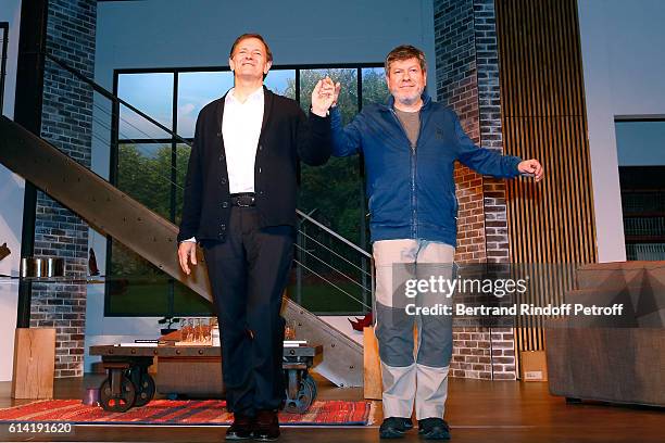 Actors Francis Huster and Regis Laspales acknowledge the applause of the audience at the end of the "A Droite A Gauche" : Theater Play at Theatre des...