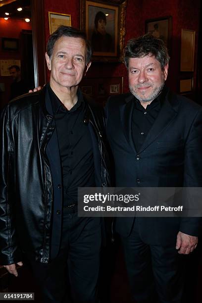 Actors of the piece Francis Huster and Regis Laspales after the "A Droite A Gauche" : Theater Play at Theatre des Varietes on October 12, 2016 in...