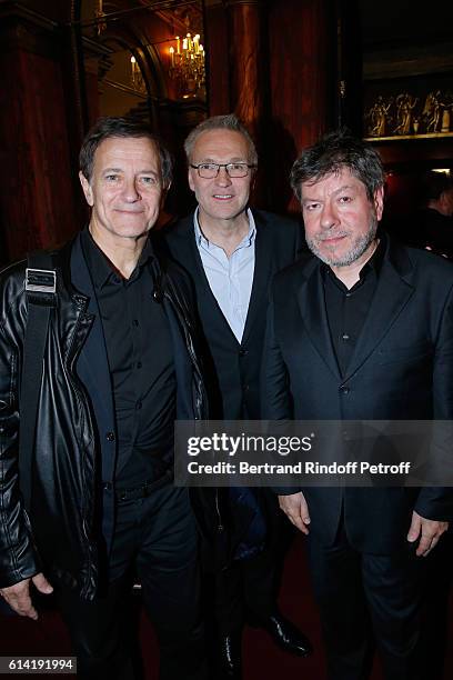 Autor of the piece, Laurent Ruquier standing between actors of the piece Francis Huster and Regis Laspales pose after the "A Droite A Gauche" :...