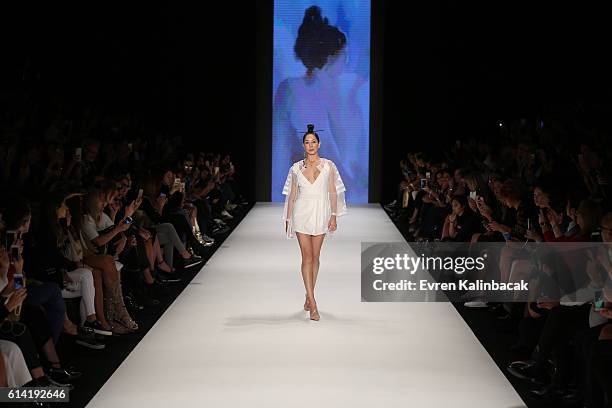 Model walks the runway at the Selma State show during Mercedes-Benz Fashion Week Istanbul at Zorlu Center on October 12, 2016 in Istanbul, Turkey.