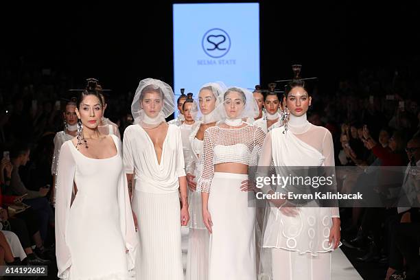 Models walk the runway at the Selma State show during Mercedes-Benz Fashion Week Istanbul at Zorlu Center on October 12, 2016 in Istanbul, Turkey.