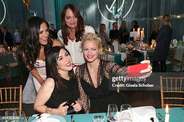 Bettina Zimmermann, Natalia Woerner, Judith Williams and Franziska Knuppe make a selfie during the 5th anniversary of Westwing on October 12, 2016 in...