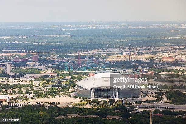 daytime aerial view of at&t stadium in arlington, texas - dallas cowboys stadion stockfoto's en -beelden