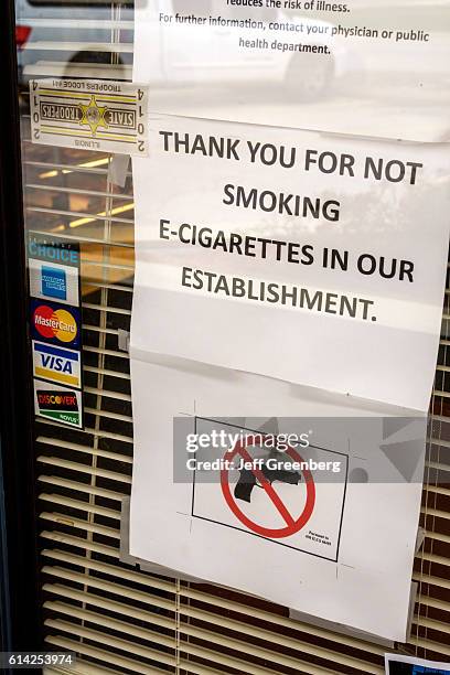 Jubelt's Bakery & and Restaurant sign on entrance door saying thankyou for not smoking e-cigarettes.