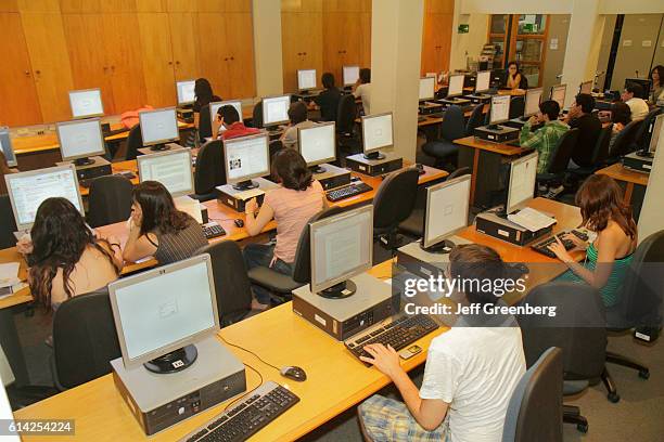 University of Chile, students studying in library.