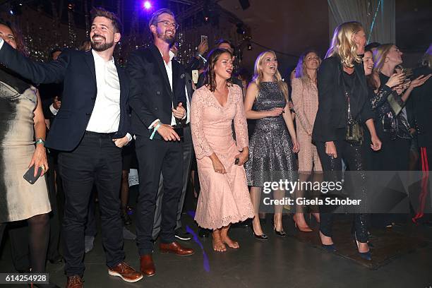 Joko Winterscheidt and Jessica Schwarz, barefoot, and Delia Fischer, CEO and Founder of Westwing during the 5th anniversary of Westwing on October...