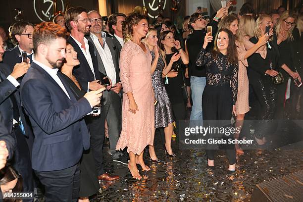 Joko Winterscheidt and Jessica Schwarz, barefoo during the 5th anniversary of Westwing on October 12, 2016 in Munich, Germany.