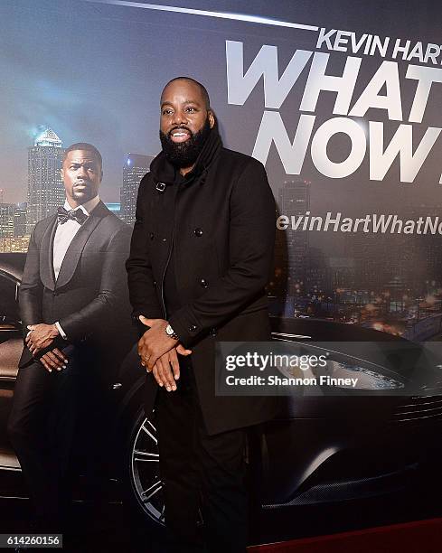 Writer/director David E. Talbert walks the red carpet at the screening of "Kevin Hart: What Now?" at Regal Gallery Place on October 12, 2016 in...