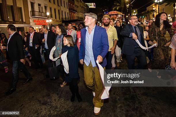 Woody Harrelson participates in a second line parade following the New Orleans premiere of 'LBJ' at The Orpheum Theatre on October 12, 2016 in New...