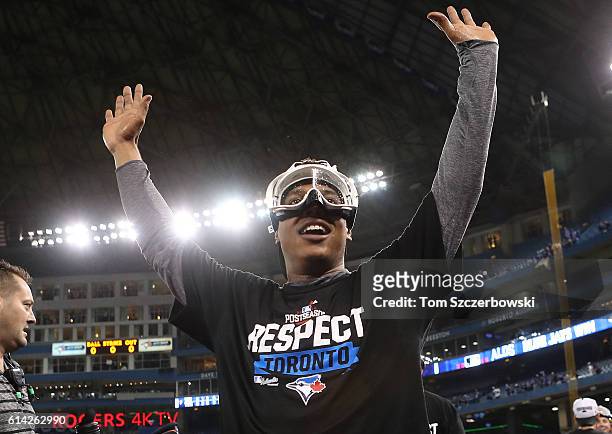 Marcus Stroman of the Toronto Blue Jays celebrates with fans after winning the game and series in the tenth inning during MLB game action against the...