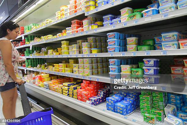 Express de Lider, grocery store, refrigerator shelves of butter.