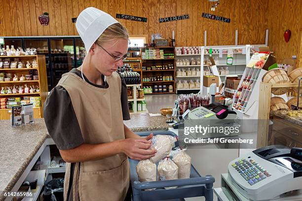 Amish employee in Shady Crest Orchard & and Farm Market.