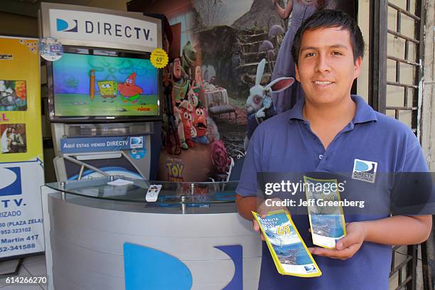 Direct TV, satellites television provider sales agent giving out flyers.