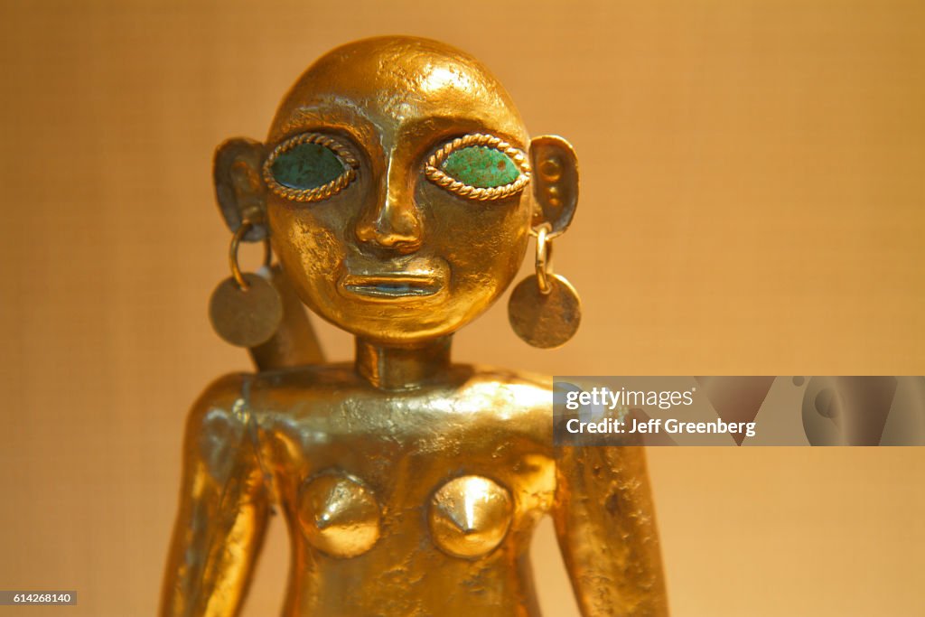JW Marriott hotel museum display of pre-Columbian art, a female figurine.