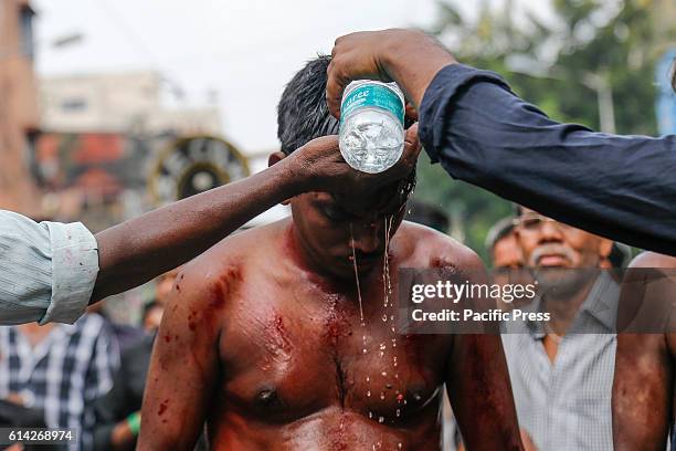 Shiites Muslims join in a religious rally during the celebration of the day Ashura on 10th of Muharram, the first month of the Islamic lunar calendar...