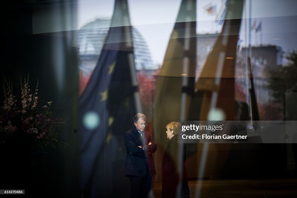 German Chancellor Angela Merkel Talks With Heusgen