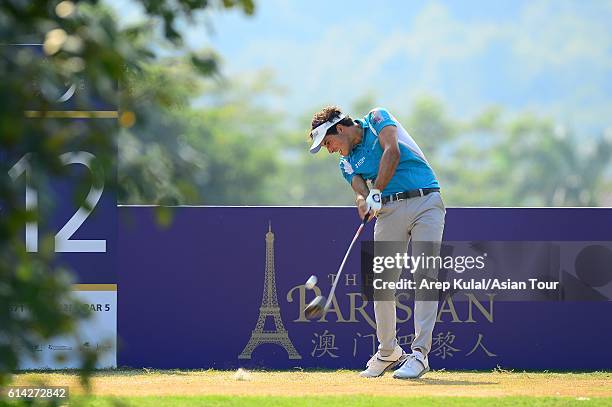 Carlos Pigem of Spain plays a shot during round one of the 2016 Venetian Macao Open at Macau Golf and Country Club on October 13, 2016 in Macau,...