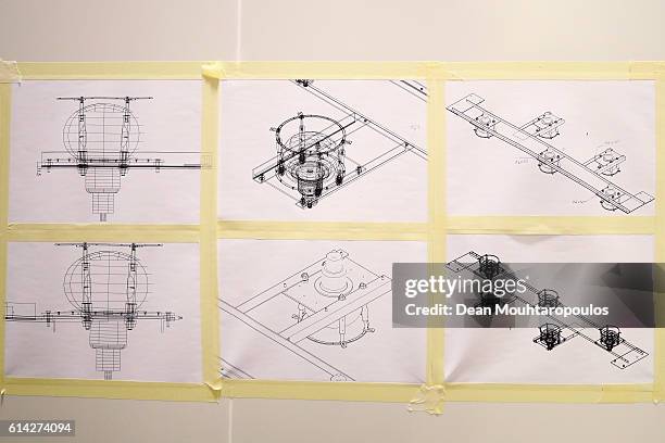 Detailed view in the Clean Room of the ICARUS project detector diagrams with its new cryostat the cold box containing the detector and...